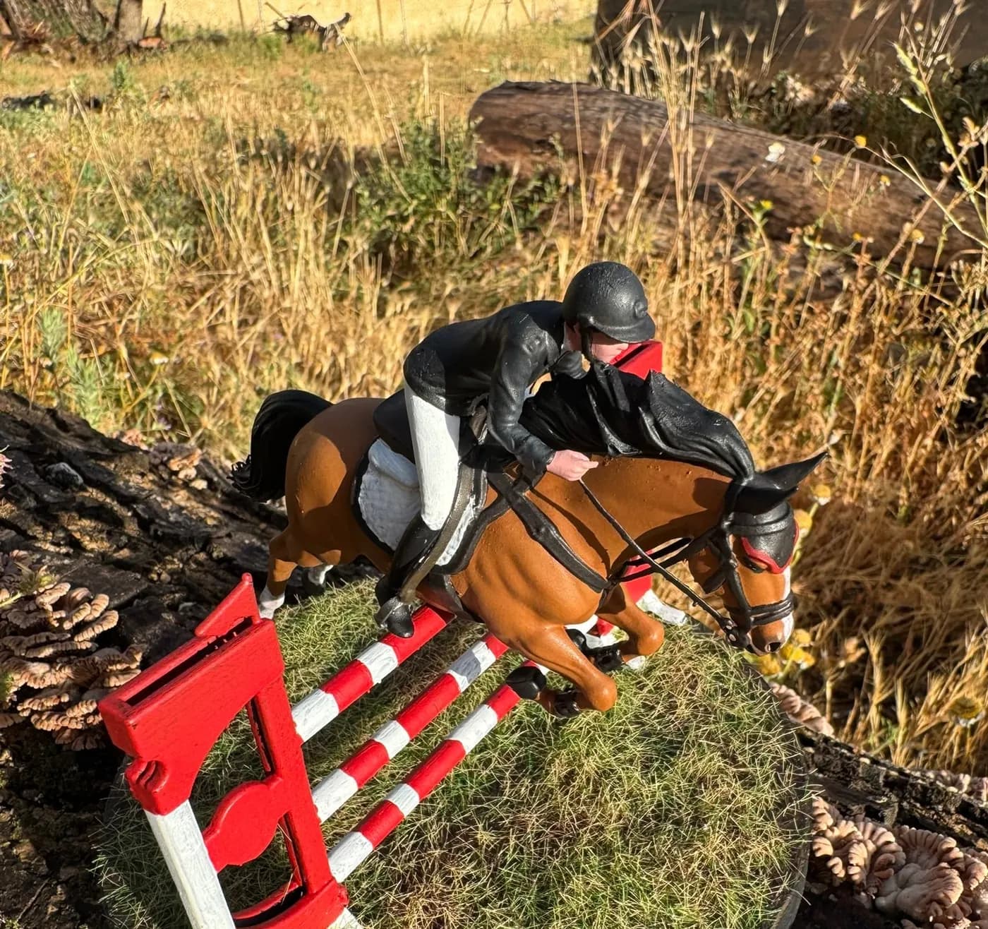 Miniature figure of a rider on horseback